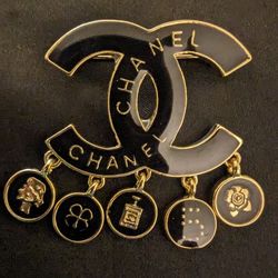 CC BLACK AND GOLD PIN