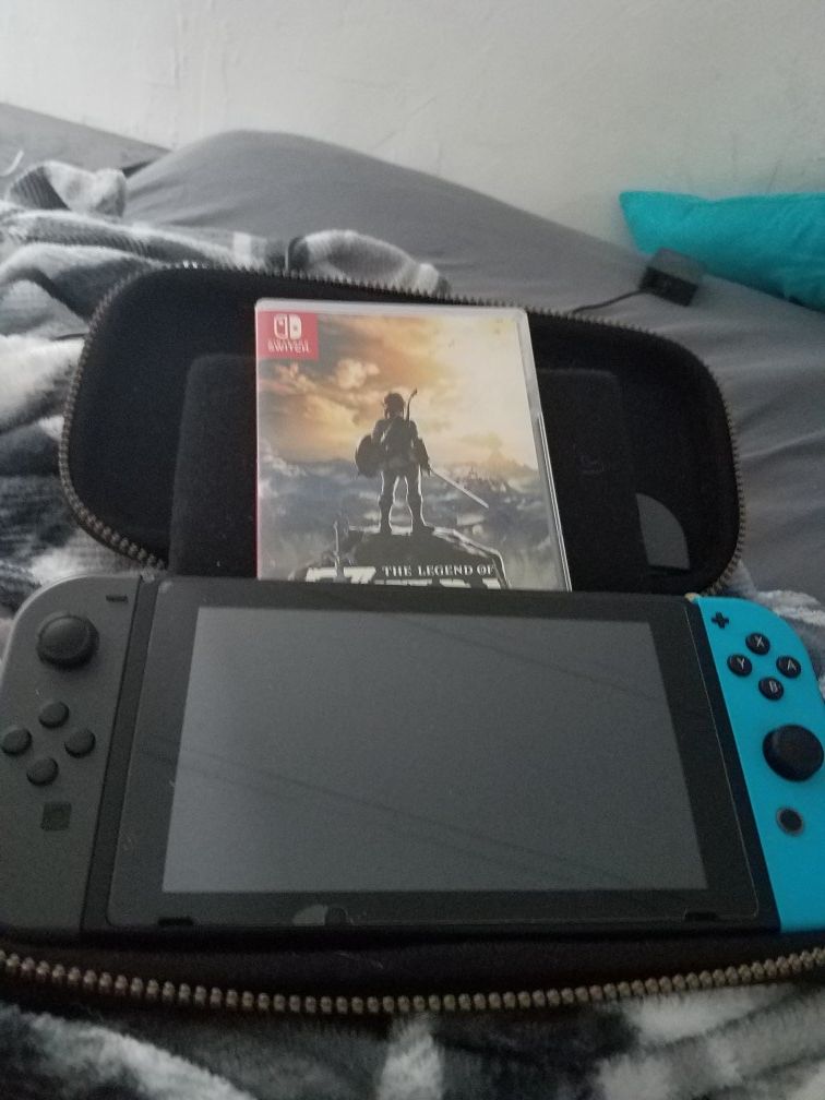 Nintendo Switch ( comes with 2 games)