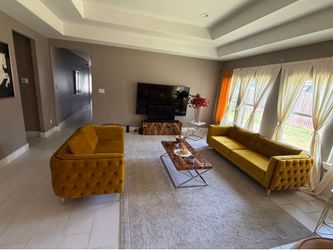 Sofa, loveseat, coffee table, and tables