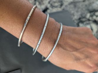 Silver toned bracelets