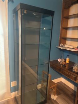 2 identical tempered glass display cabinets