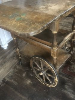 Antique old fashioned buffet table with wheels and handle great timeless piece extremely rare. will deliver straight to your door 100 bucks