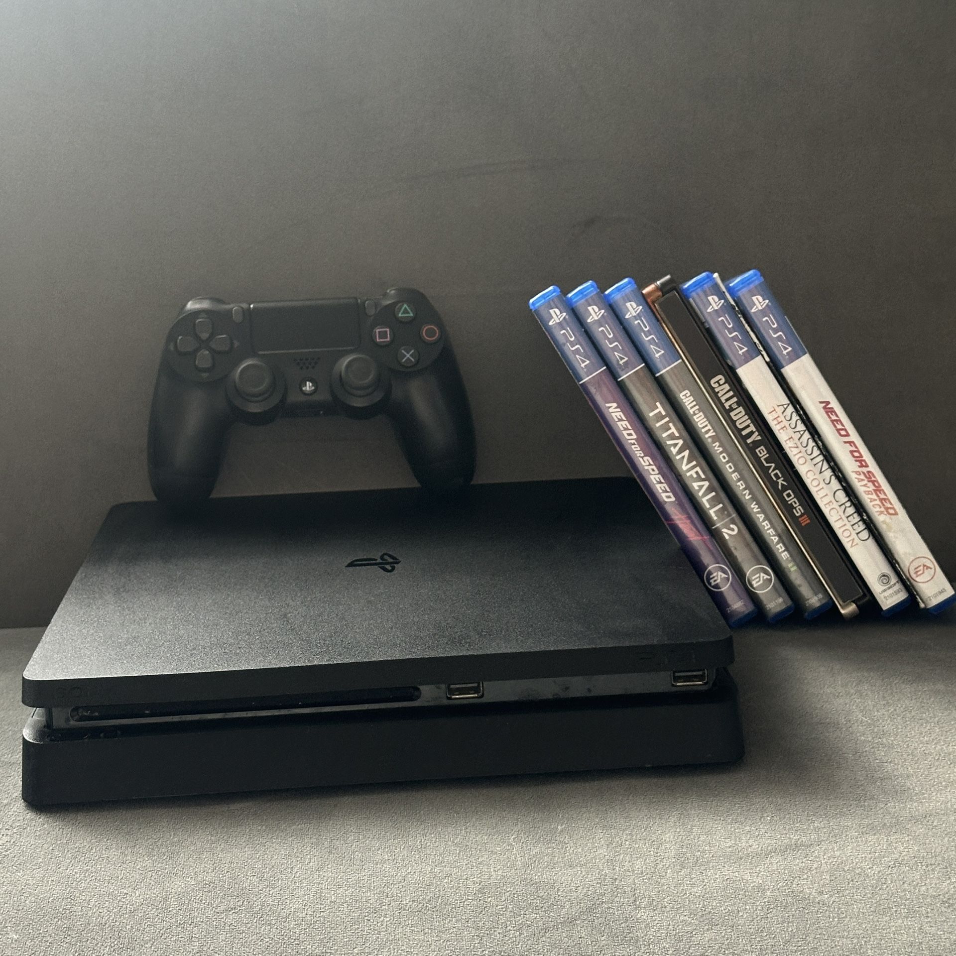 1TB PS4 console with controller and games