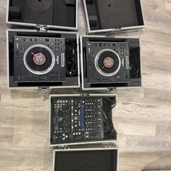 Behringer DDM 4000 DJ mixer and 2 Numark V7 $500 obo