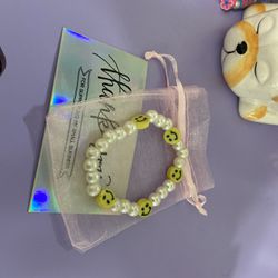 Pearl and Happy face charm bracelet
