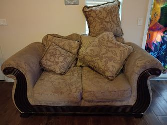 Traditional Loveseat with Wood Trim and Pillows