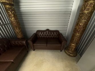 Chesterfield 3-seater sofa in brown faux leather with tufted back and rolled arms