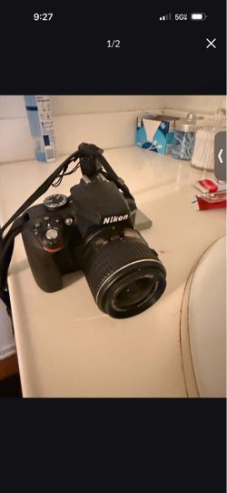 Nikon DSLR Camera with Lens and Strap