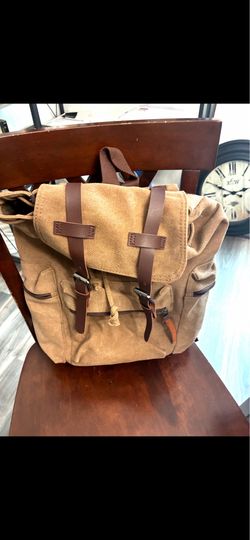 Brown corduroy and leather backpack