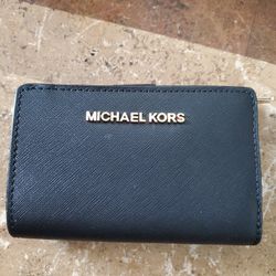 Michael Kors Wallets And Coach Wristlets