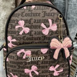 Juicy Couture simply sweet coho pink
bow backpack