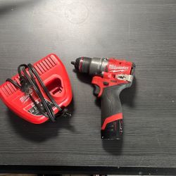Milwaukee M12 Drill Battery And Charger
