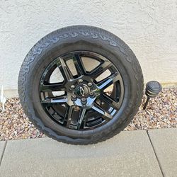 New!! 33” Bridgestone Dueler A/T Tires And Chevy Black Wheels,Tires And Wheels