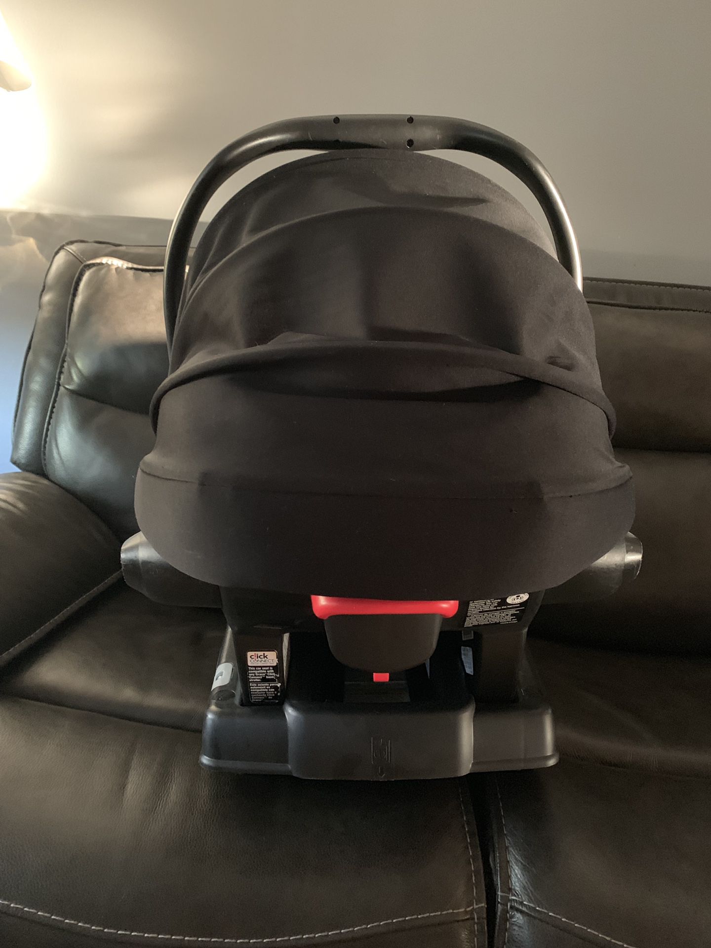 Graco infant car seat and base, black. Original purchase price $250.00.