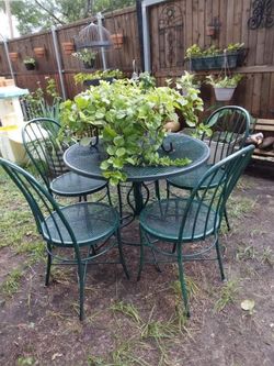 Wrought patio table set with glass $600 each
