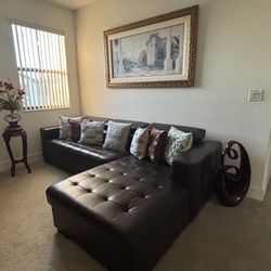 Leather Sofa With Chaise and Pull-Out Full Size Bed