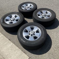 4 X 265/65r17 6x5.5 6x139.7 4Runner Tacoma Stock Rims With Tires !