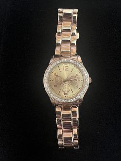 Womans gold colored Watch