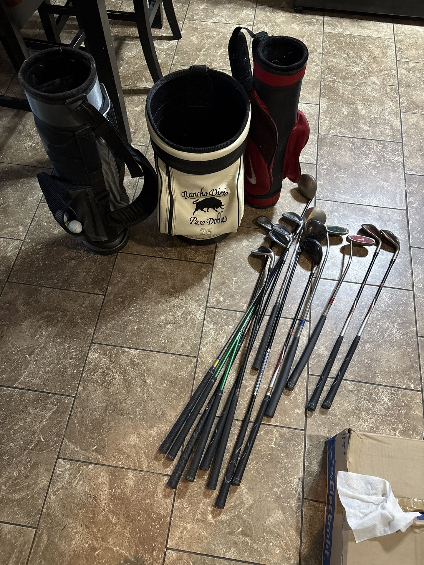 Golf Clubs And Suitcases