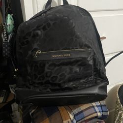 Large black, Michael Kors animal print backpack