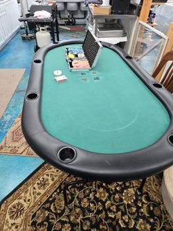 Poker table with folding legs