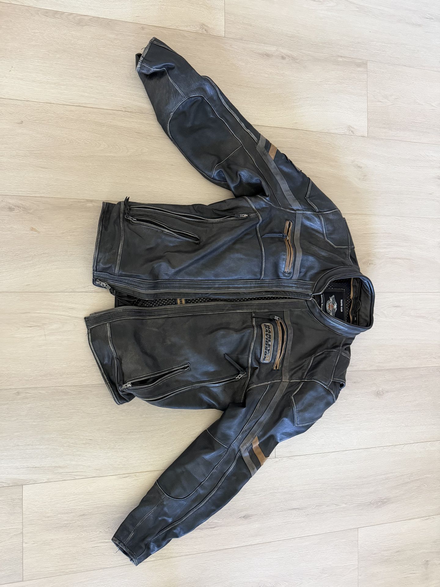 Harley Davidson leather jacket, vest, chaps and wallet with chain.