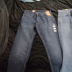 Levi 569 loose straight jeans 32x30 two pair one dark denim one light denim.