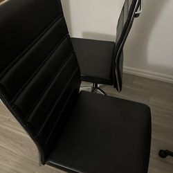 Two Modern Leather Office Chairs