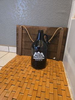 Red Hook amber glass jug.bottom 64 ounces