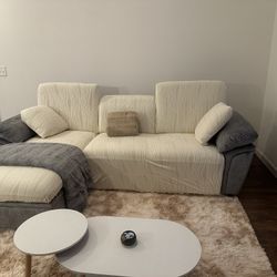 Great Quality L-shape sleeper sectional with storage and two pillows used for less than a year