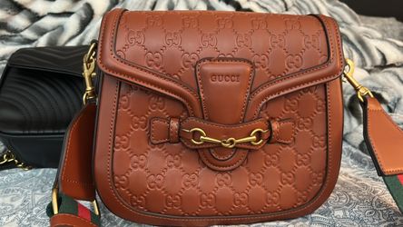 GG Embossed Leather Shoulder Bag