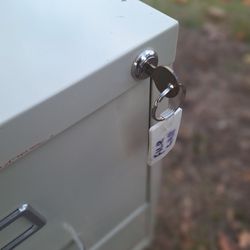 FILING CABINET WITH KEY.