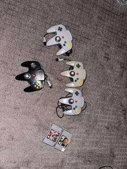 N64 Controllers And 2 Games