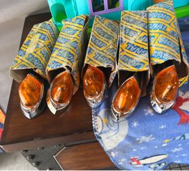 five vintage amber cab marker clearance lights with chrome housings. New. Firm price