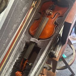 Violin used with dusty case