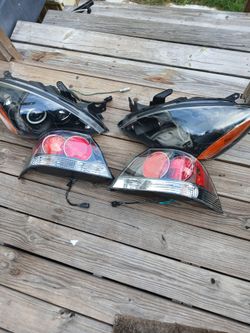 04-07 Mitsubishi Lancer Aftermarket Headlight Taillight assembly set