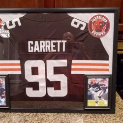 MYLES GARRETT OF THE CLEVELAND BROWNS, CUSTOM STITCHED FRAMED JERSEY.