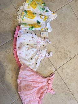 Baby girl gymboree dresses size 0-3 months
