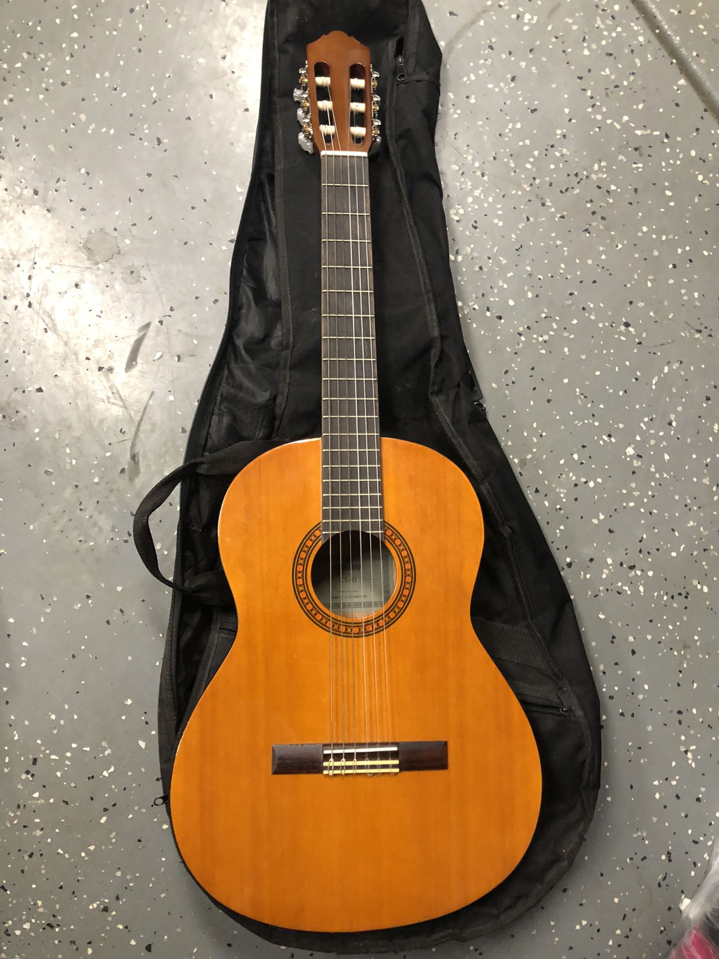 Guitar With Case In Excellent Condition