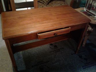 DESK SOLID WOOD EXCELLENT CONDITION. 48 INCH LONG 30 INCH WIDE GREAT FOR HOME OR OFFICE OR HOME SCHOOL FOR THE KIDS