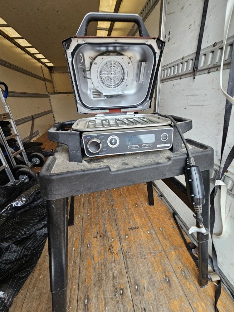 All-in-one Master Grill, BBQ Smoker, and Outdoor Air Fryer for authentic Woodfire flavors