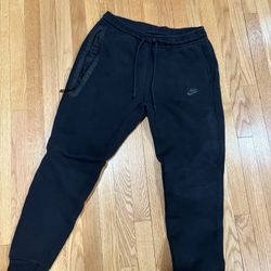 nike tech pants size large