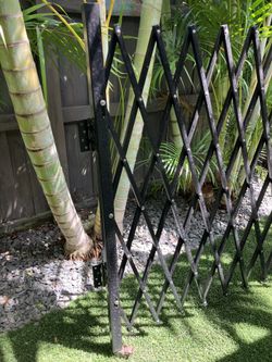 Metal Gate - Adjustable with floor Rollers