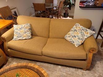 Tan Sofa with Wood Frame