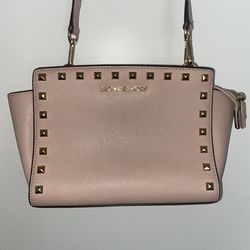 Michael Kors Selma Studded Medium Leather Crossbody in Pastel Pink.