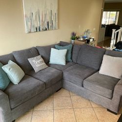 Gray Sectional Couch. Feather Cushions 