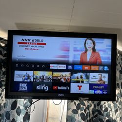 Wall Mounted TV w/firestick 