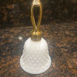 Vintage Avon milk glass bell bottle.