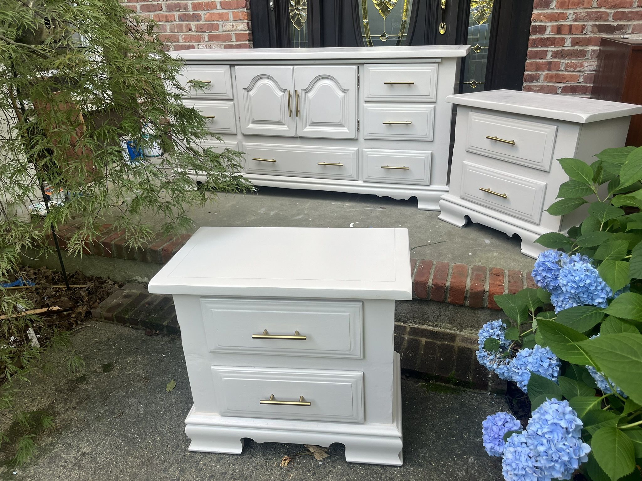 Refinished solid wood three piece set with the dresser and two end tables.
