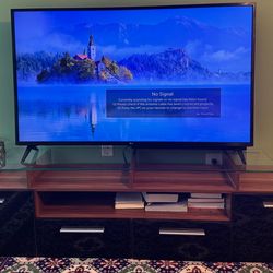 LG 60” Screen TV – good  Condition and Modern TV Stand / Media Console – Black & Wood Finish